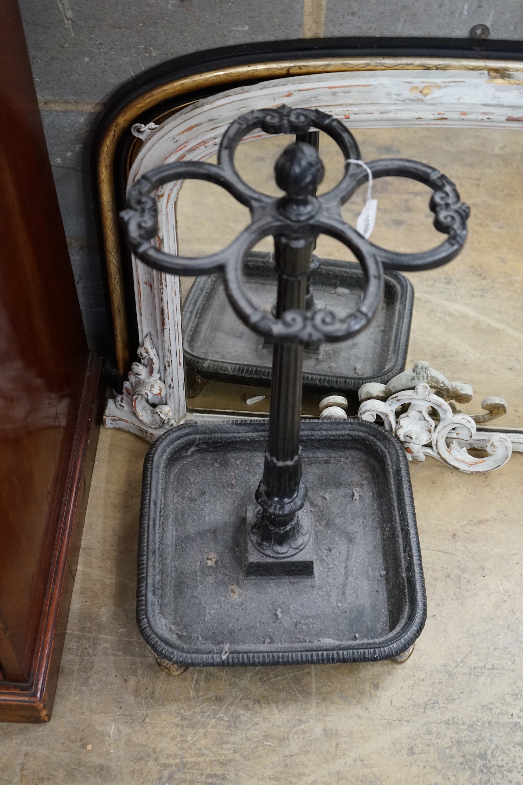 A Victorian style cast iron four division stick stand, height 66cm